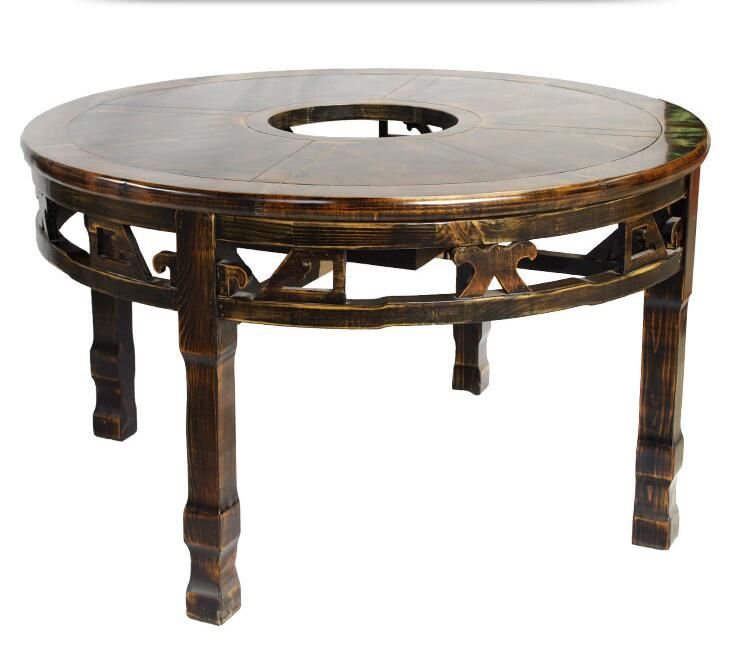 寶雞火鍋店的實(shí)木火鍋?zhàn)雷?jpg